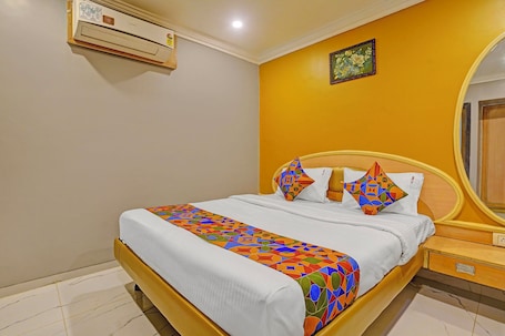 Deluxe Room | Egyptian cotton sheets, premium bedding, in-room safe, free WiFi. Fabhotel Stay Land Plus