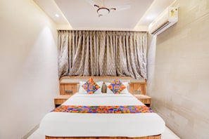 Deluxe Room | Egyptian cotton sheets, premium bedding, in-room safe, free WiFi - Fabhotel Mood Inn (Vasai)