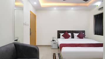 Deluxe kamer | Lakens van Egyptisch katoen, luxe beddengoed, een kluis op de kamer