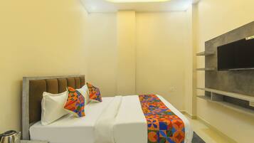 Kamar Deluks | Seprai katun Mesir, seprai premium, brankas, dan Wi-Fi gratis