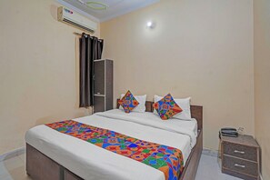 Habitación Deluxe | Sábanas de algodón egipcio, ropa de cama de alta calidad, caja fuerte