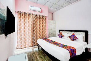 Deluxe-værelse | Egyptiske bomuldslagner, premium-sengetøj, pengeskab på værelset