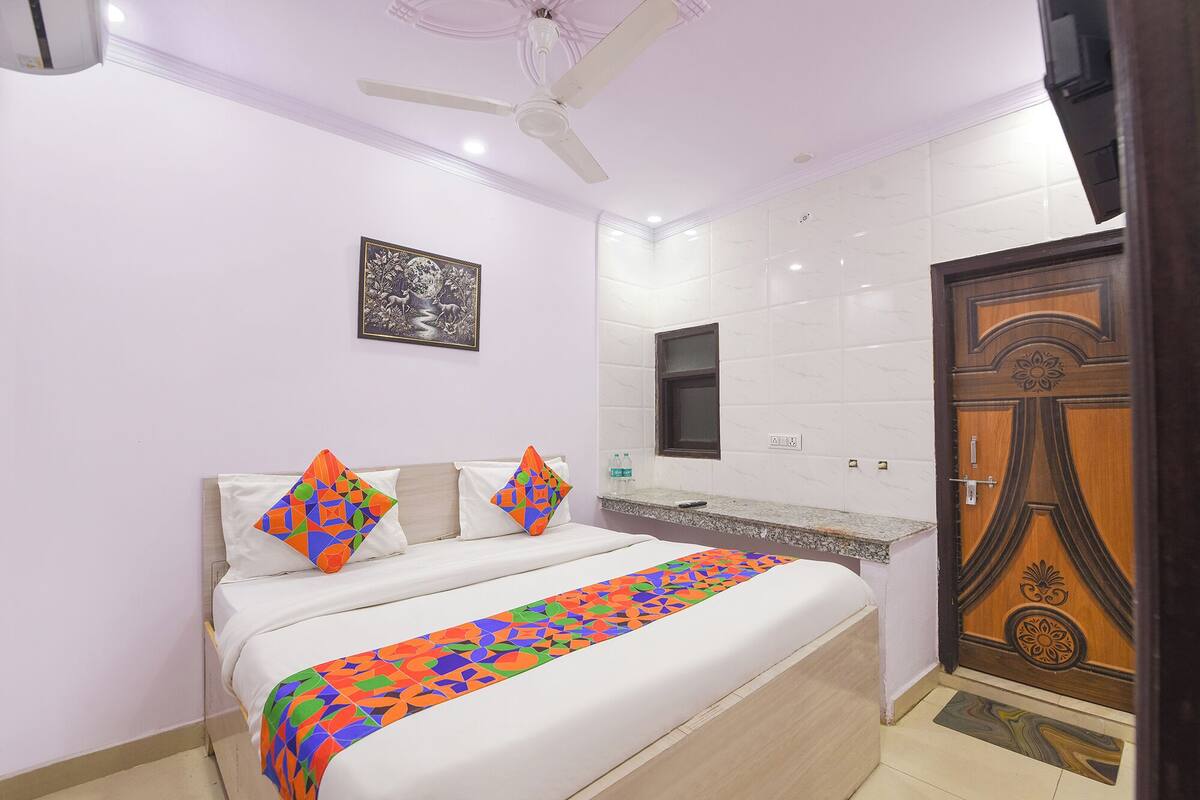 Deluxe kamer | Lakens van Egyptisch katoen, luxe beddengoed, een kluis op de kamer