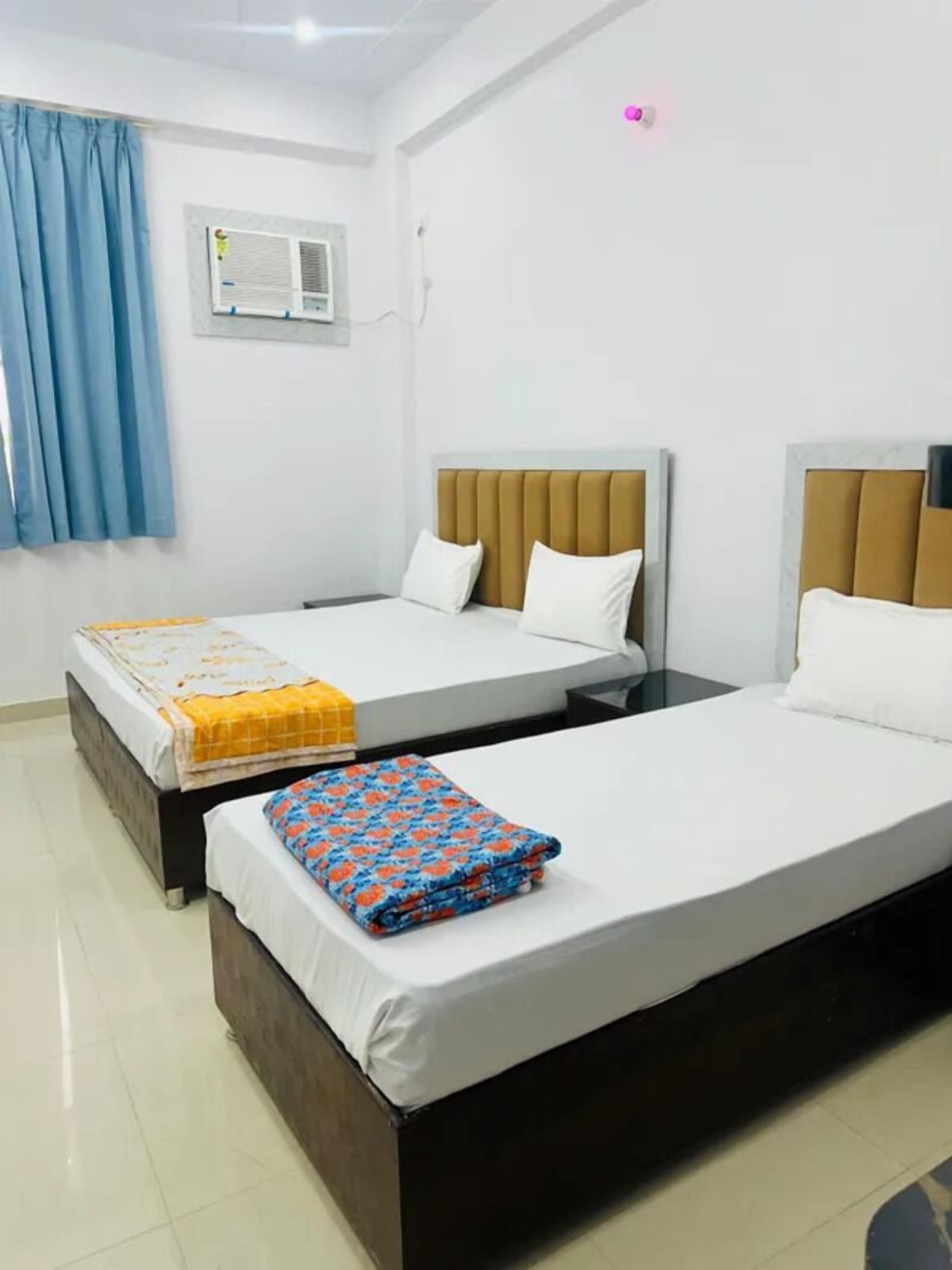 Familieværelse | Egyptiske bomuldslagner, premium-sengetøj, pengeskab på værelset