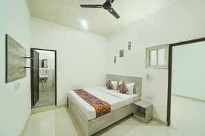 Chambre Deluxe | Draps en coton égyptien, literie de qualité, coffre-fort