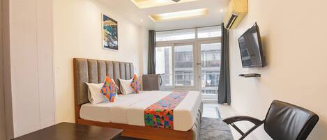 Deluxe kamer | Lakens van Egyptisch katoen, luxe beddengoed, een kluis op de kamer