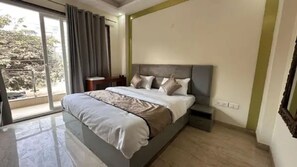 Deluxe-værelse | Egyptiske bomuldslagner, premium-sengetøj, pengeskab på værelset