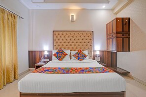 Egyptian cotton sheets, premium bedding, in-room safe, free WiFi - Fabhotel Satyan Inn (Rahata)