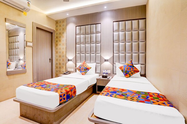 Family Room | Egyptian cotton sheets, premium bedding, in-room safe, free WiFi - Fabhotel Abrol Suites (Mumbai)