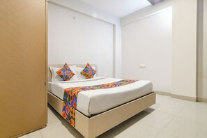 Habitación Deluxe | Sábanas de algodón egipcio, ropa de cama de alta calidad, caja fuerte