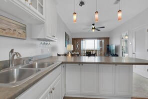 Fridge, microwave, oven, stovetop - Charming 2 Bedroom Condo on the Water with Sunset Views (Pensacola Beach)