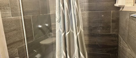 Hair dryer, towels, soap, toilet paper