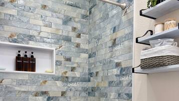 Hair dryer, towels, soap, shampoo