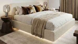 A modern bedroom with a large bed, bedside lamps, a mirror, and a neutral color scheme. - Exceptional place ready to welcome you (Montreuil)