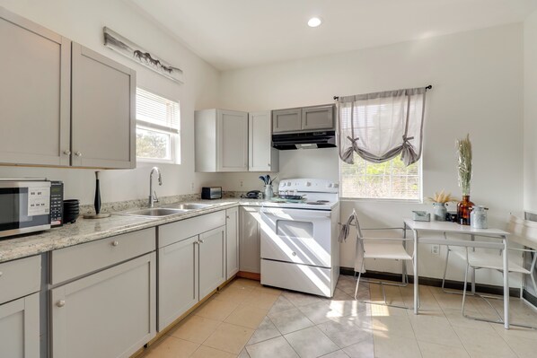 Fridge, microwave, stovetop, coffee/tea maker