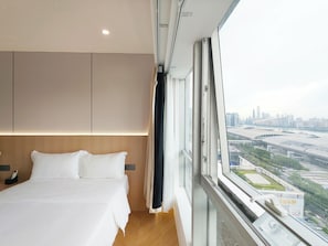 Deluxe Suite, Multiple Beds, Private Bathroom, City View | Down comforters, soundproofing, bed sheets - Paxin·High-Altitude City View Apartment (Canton Fair Complex Pazhou Subway Station Branch) (Guangzhou)