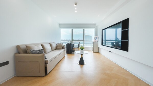 Deluxe Suite, Multiple Beds, Private Bathroom, City View | Down comforters, soundproofing, bed sheets