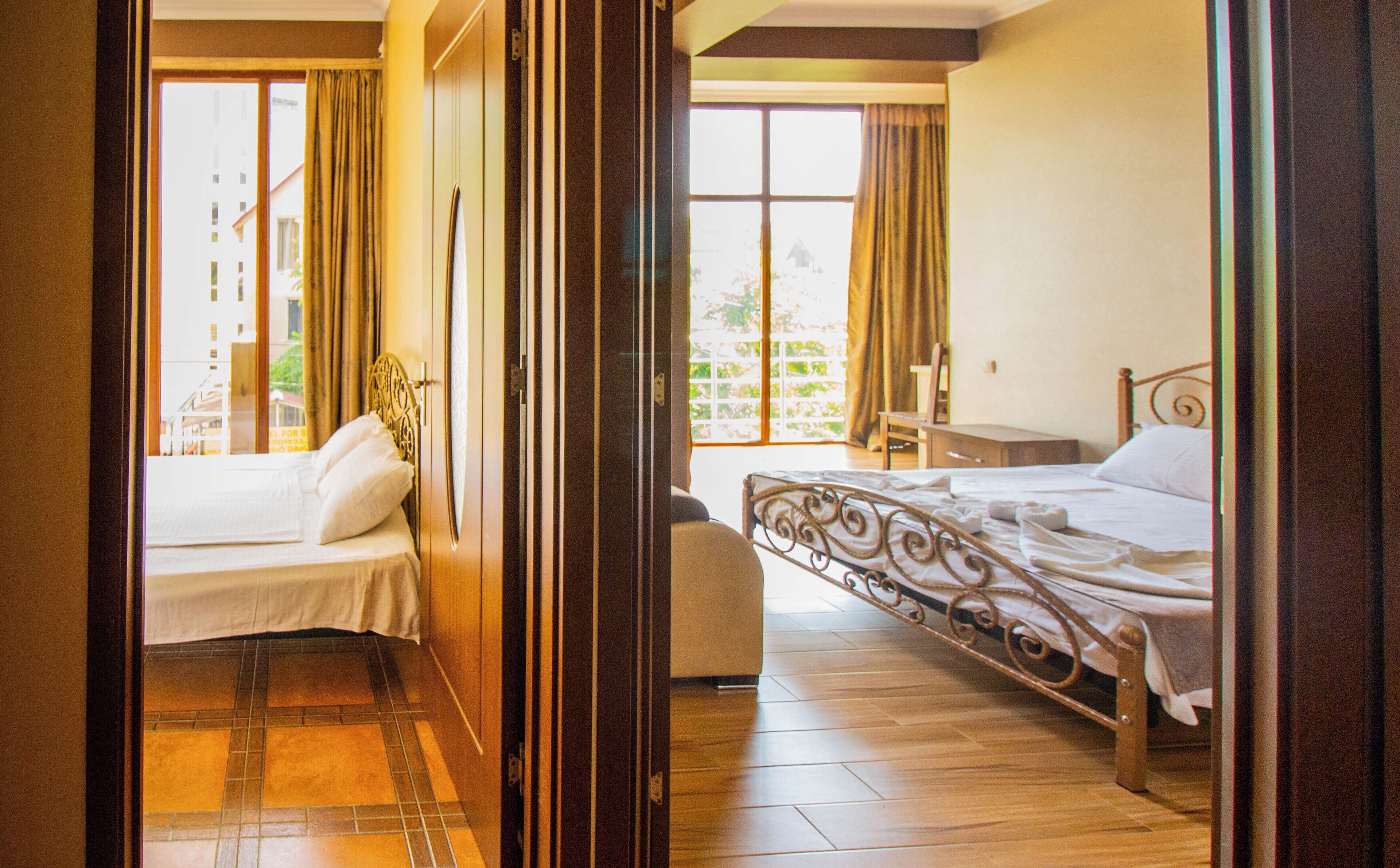 Family Studio Suite | In-room safe, iron/ironing board, free WiFi, bed sheets