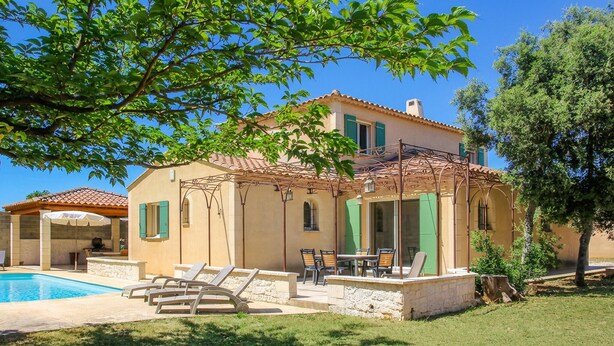 A two-story house with a swimming pool, outdoor seating, and a pergola. - Gorgeous home in Saint Didier (Saint Didier)