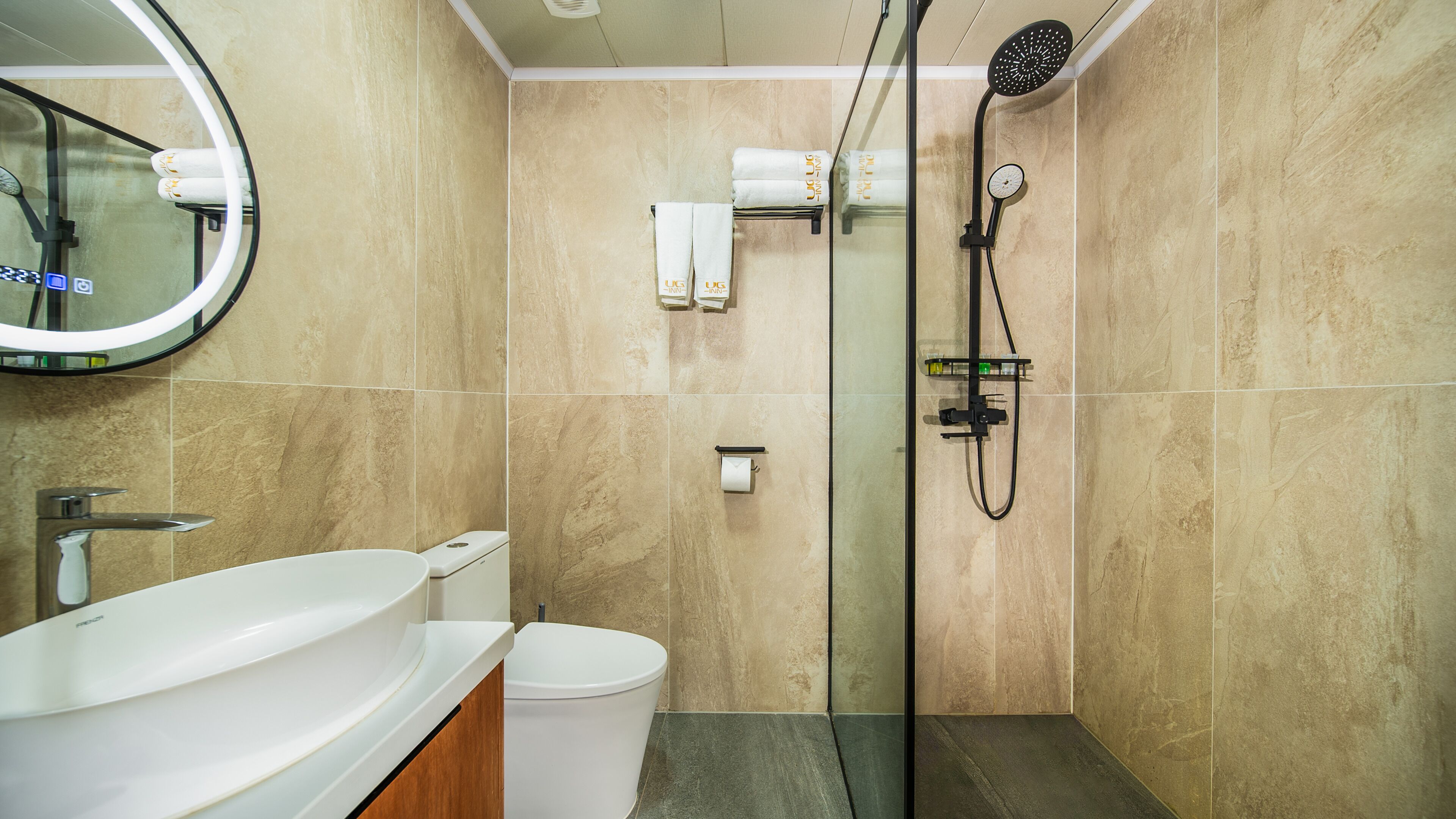 Shower, hair dryer, slippers, towels