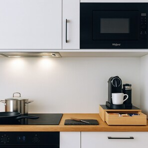 Mikrovågsugn, ugn, spishäll och diskmaskin