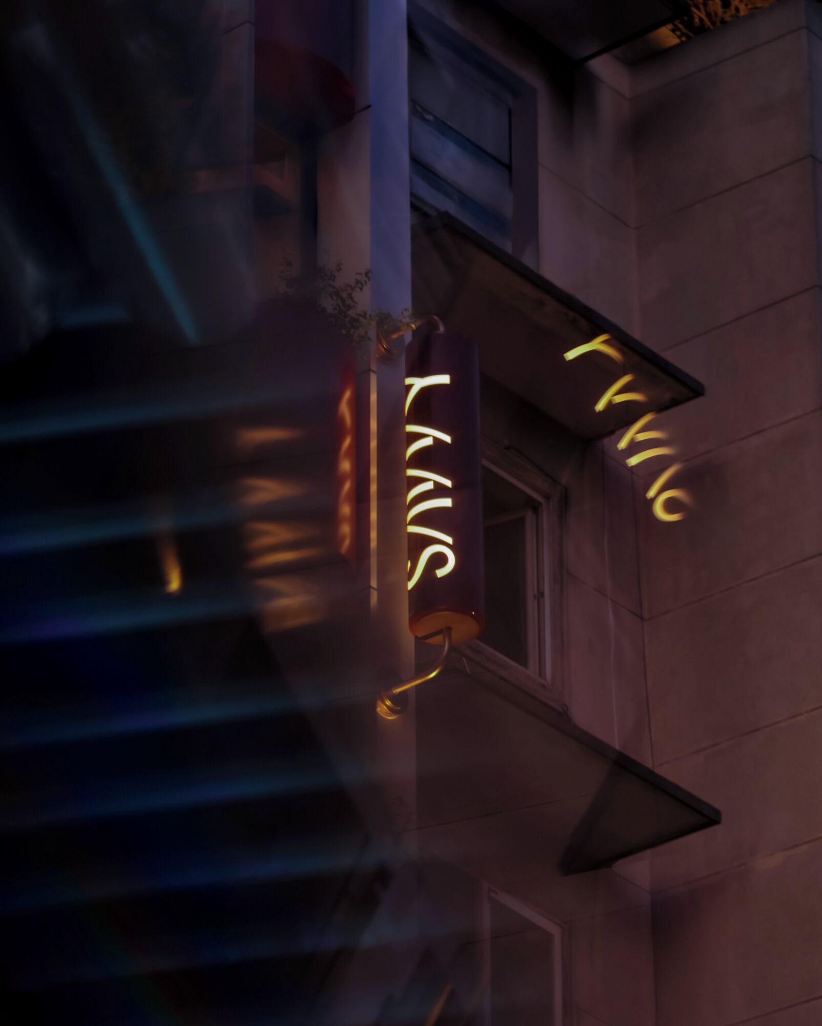 A building with a neon sign that reads 'LAVUS' and another sign that reads 'FIVE.'