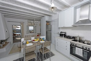 Fridge, microwave, oven, stovetop - Panoramic Villa Fos, in Mykonos, in Kalafatis area, with private pool, 4 bedrooms, 10 sleeps (Mykonos)
