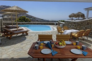 Outdoor dining - Panoramic Villa Fos, in Mykonos, in Kalafatis area, with private pool, 4 bedrooms, 10 sleeps (Mykonos)