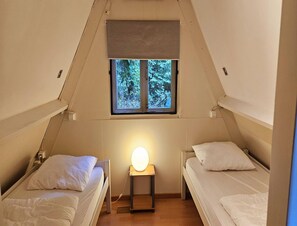 Chalet | 2 dormitorios y ropa de cama