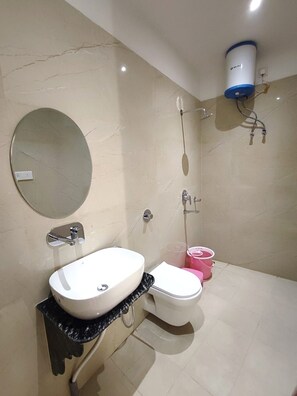 Economy Room, City View | Bathroom | Towels, soap, shampoo - S S Guest House (Varanasi)