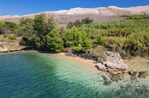 Beach - Tonino holiday house (Pag)
