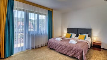 Apartment, Balcony, Garden View | In-room safe, soundproofing, iron/ironing board, free WiFi