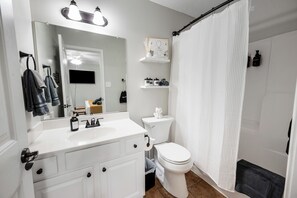 Hair dryer, towels, soap, shampoo