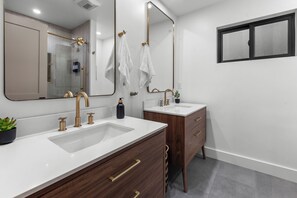 Shower, eco-friendly toiletries, hair dryer, towels