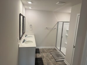 Shower, towels, soap, toilet paper - Fabulous brand new 3-bedroom 2 bath house with HVAC in charming Woodruff (Woodruff)