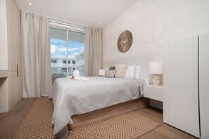 2 bedrooms, iron/ironing board, free WiFi, bed sheets - Steps to Seven Mile Beach Luxe 2-Bed at Grove Too (Seven Mile Beach)