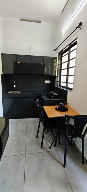 Private kitchen - Cozy Studio Near Beach Peaceful Stay in Trivandrum (Thiruvananthapuram)