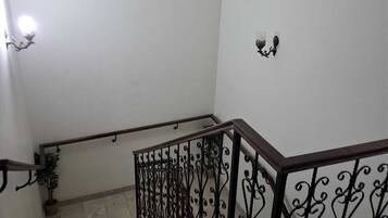 Premium bedding, memory foam beds, desk, laptop workspace