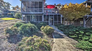 A two-story building with large windows and a balcony. - Boat Dock: Lake-view Retreat 5 Mi to Dtwn Clemson (Seneca)