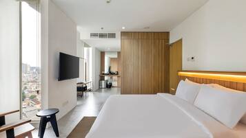 Suite ejecutiva | Escritorio, tabla de planchar con plancha, wifi gratis