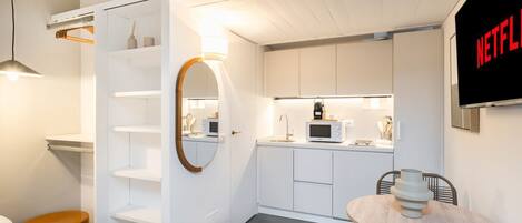 Fridge, microwave, stovetop, cookware/dishes/utensils