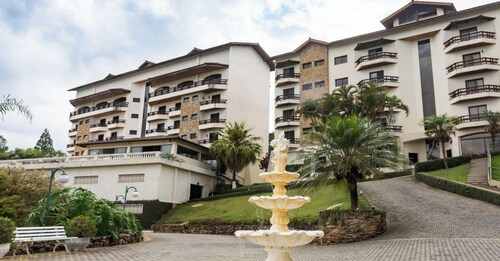 Apto em Serra Negra com Piscina e Churrasqueira