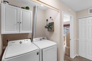 Condo, Multiple Beds, Patio, Garden View (Premiere Pointe) | Laundry - Premiere Pointe Golf Discounts (Branson)