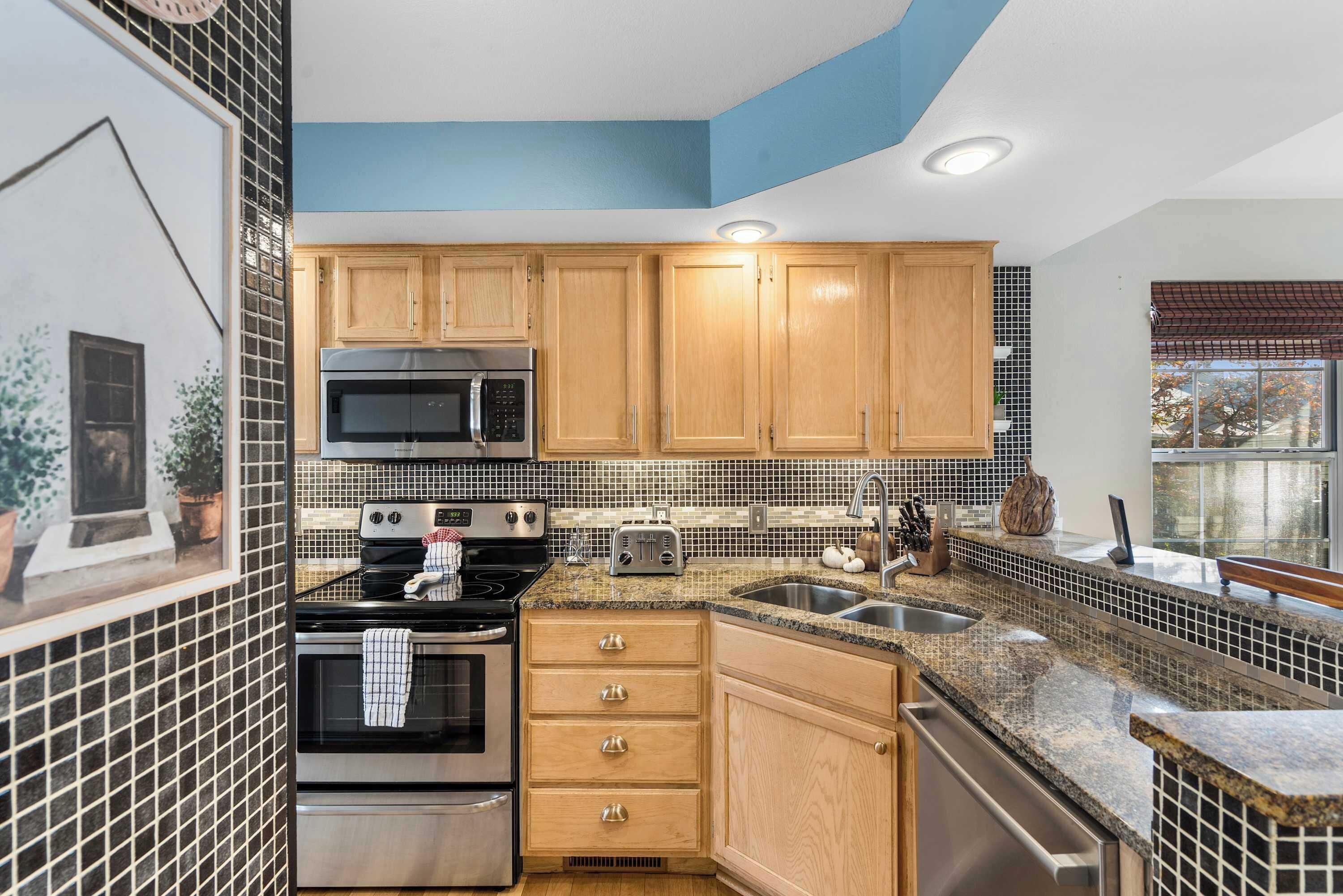 Huoneisto, useita sänkyjä, patio, näköala puutarhaan (Premiere Pointe) | Yksityinen keittiö