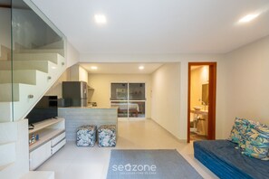 Basic Apartment | Living area | 32-inch Smart TV with digital channels