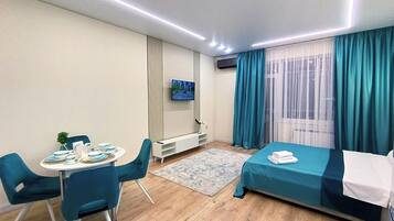 1 dormitori, planxa i posts de planxar, wifi i roba de llit