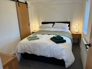 Iron/ironing board, WiFi, bed sheets - Escape to Niarbyl’s Wild Shores – Stay at Oystercatcher Barn. Pet-Friendly! (Patrick)