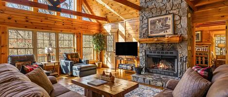 Smart-TV, Kamin, Tischtennisplatte, Bücher