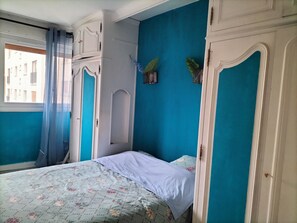 Iron/ironing board, travel crib, bed sheets