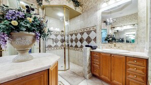 Shower, jetted tub, towels, soap